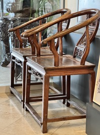 A pair of Chinese wooden 'horseshoe' chairs, 19/20th C.