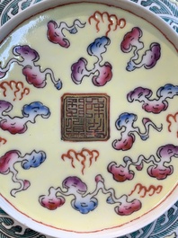 Two Chinese eggshell famille rose 'dragon' bowls on wooden stands, Qianlong mark, 20th C.