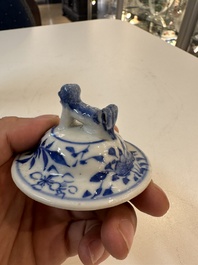 A Chinese blue and white garniture of five vases with river landscapes, 19th C.