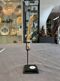 A Tibetan carved bone apron ornament with a dakini, 19th C.