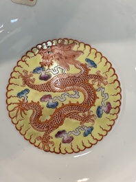 Two Chinese eggshell famille rose 'dragon' bowls on wooden stands, Qianlong mark, 20th C.