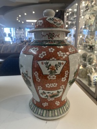 A Chinese famille verte vase and two covered vases, 19th C.