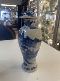 A Chinese blue and white garniture of five vases with river landscapes, 19th C.