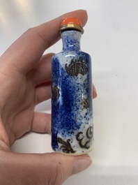 Four Chinese blue, white and copper-red snuff bottles, Yongzheng mark, 19th C.