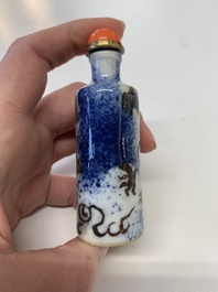 Four Chinese blue, white and copper-red snuff bottles, Yongzheng mark, 19th C.