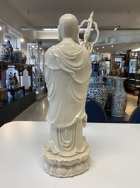 Three Chinese Dehua blanc de Chine figures of Guanyin and a monk, He Chaozong 何朝宗 and Dehua 德化 mark, 20th C.