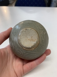Eight Chinese Longquan celadon jarlets with floral design, Song/Yuan