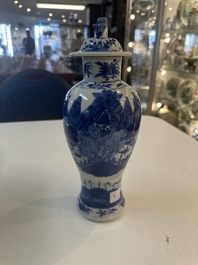 A Chinese blue and white garniture of five vases with river landscapes, 19th C.