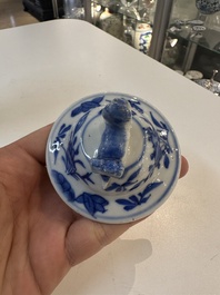 A Chinese blue and white garniture of five vases with river landscapes, 19th C.