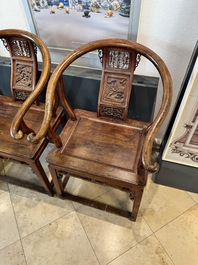 A pair of Chinese wooden 'horseshoe' chairs, 19/20th C.