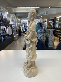 Three Chinese Dehua blanc de Chine figures of Guanyin and a monk, He Chaozong 何朝宗 and Dehua 德化 mark, 20th C.
