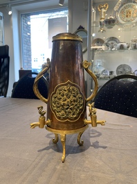 A rare and fine Chinese partly-gilt copper chocolate pot with tripod stand, 18th C.