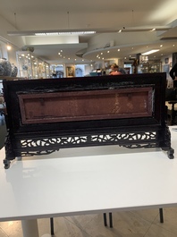 A Chinese wooden table screen with a carved stone 'dragon' plaque, 20th C.