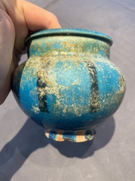 A fine Raqqa turquoise-glazed striped jar, Syria, 13th C.
