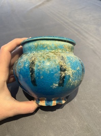 A fine Raqqa turquoise-glazed striped jar, Syria, 13th C.
