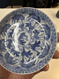 11 Japanese blue and white cups and 12 saucers with floral design, Chenghua mark, Meiji, 19th C.