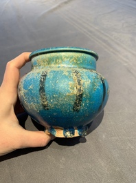 A fine Raqqa turquoise-glazed striped jar, Syria, 13th C.
