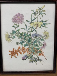 A pair of Chinese famille rose plaques in wooden frames, 20th C.