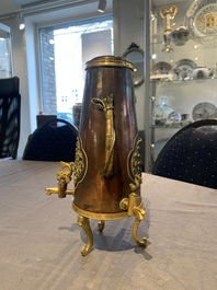 A rare and fine Chinese partly-gilt copper chocolate pot with tripod stand, 18th C.
