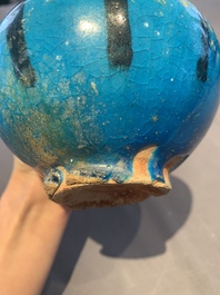 A fine Raqqa turquoise-glazed striped jar, Syria, 13th C.