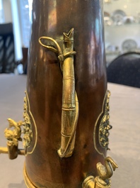 A rare and fine Chinese partly-gilt copper chocolate pot with tripod stand, 18th C.