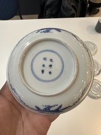 11 Japanese blue and white cups and 12 saucers with floral design, Chenghua mark, Meiji, 19th C.