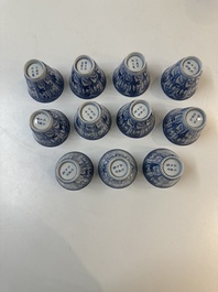 11 Japanese blue and white cups and 12 saucers with floral design, Chenghua mark, Meiji, 19th C.