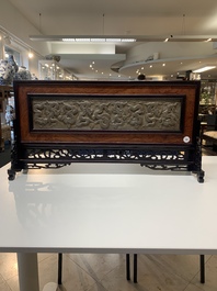 A Chinese wooden table screen with a carved stone 'dragon' plaque, 20th C.