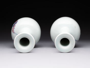 A pair of Chinese blue, white and copper-red 'bats among the clouds' vases, 19th C.