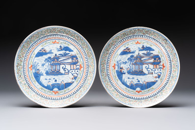 A pair of Chinese polychrome-decorated blue and white plates and a blue and white covered jar, Qianlong mark, 19th C.