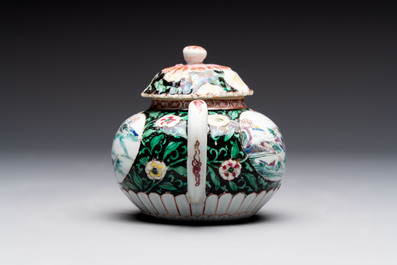 A Chinese famille rose teapot and stand, and a famille rose black-ground teapot, Yongzheng/Qianlong