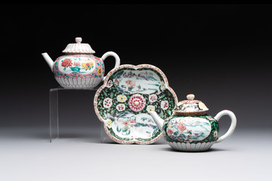 A Chinese famille rose teapot and stand, and a famille rose black-ground teapot, Yongzheng/Qianlong