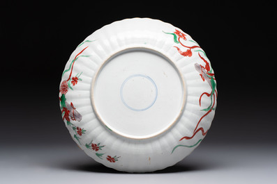 A Dutch-decorated Chinese plate, an Imari-verte dish and a blue and white dish, Kangxi/Yongzheng