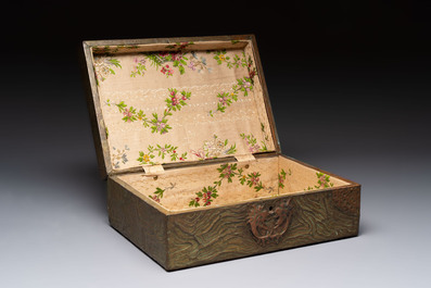 Alfred Daguet (Paris, 1875-1942): An Art Nouveau repouss&eacute; brass- and copper-mounted box with 'crabs' design and inset glass eyes, ca. 1900