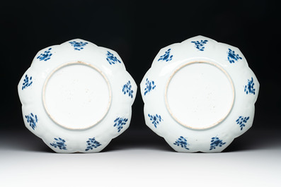 A pair of Chinese blue and white 'lotus' dishes and a pair of plates, Kangxi/Yongzheng