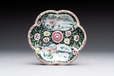 A Chinese famille rose teapot and stand, and a famille rose black-ground teapot, Yongzheng/Qianlong