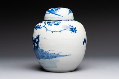 A pair of Chinese polychrome-decorated blue and white plates and a blue and white covered jar, Qianlong mark, 19th C.