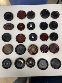 A large collection of 87 Chinese wooden stands, 19/20th C.