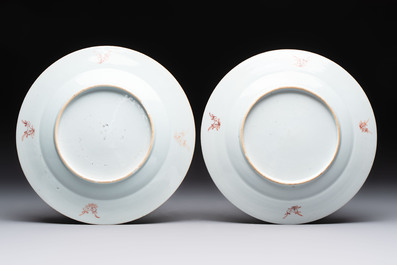 Three Chinese famille rose plates with birds among flowers and a grisaille plate, Yongzheng/Qianlong