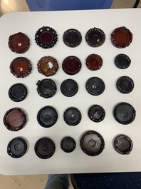 A large collection of 87 Chinese wooden stands, 19/20th C.