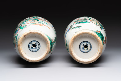 A pair of Chinese famille verte vases with narrative design, 19th C.