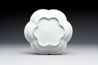 A Chinese famille rose teapot and stand, and a famille rose black-ground teapot, Yongzheng/Qianlong