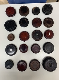 A large collection of 87 Chinese wooden stands, 19/20th C.