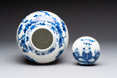 A pair of Chinese polychrome-decorated blue and white plates and a blue and white covered jar, Qianlong mark, 19th C.