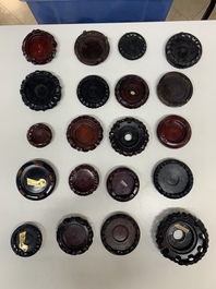 A large collection of 87 Chinese wooden stands, 19/20th C.