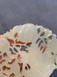 Two Chinese white and celadon jade 'crane' and 'deity' plaques, Qing