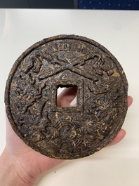 Seven Chinese Pu'er tea and black tea bricks, 20th C.