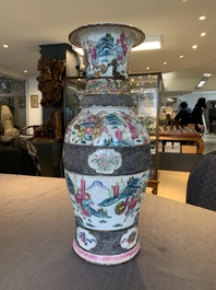 A pair of Chinese Nanking famille rose vases with narrative design, 19th C.