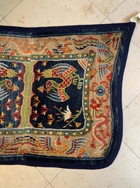 Two Tibetan saddle rugs with dragons and phoenixes, 19th C.