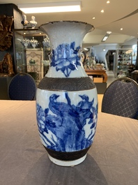 Seven Chinese Nanking blue and white and famille verte crackle-glazed vases, 19/20th C.